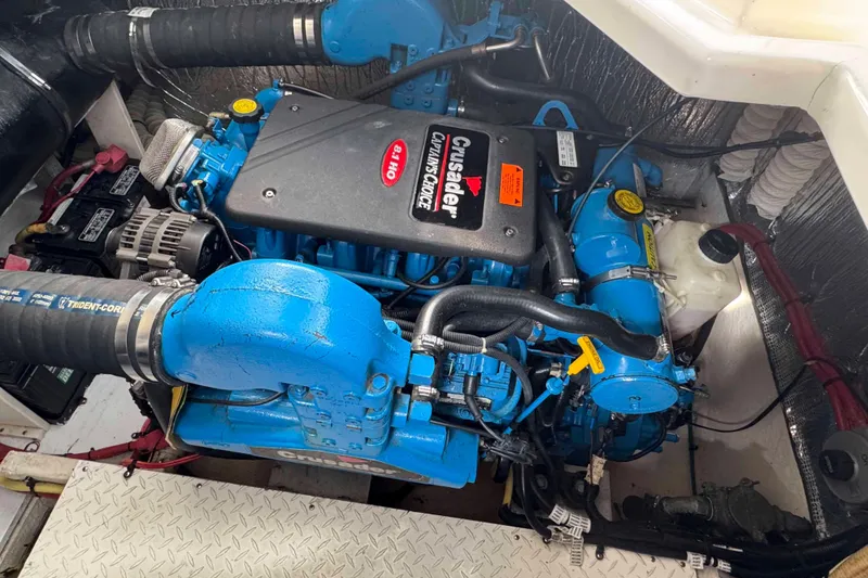 Slide: The Image of Engine compartment of 2002 Cruisers Yachts 3870 Express with Crusader engine. - 35