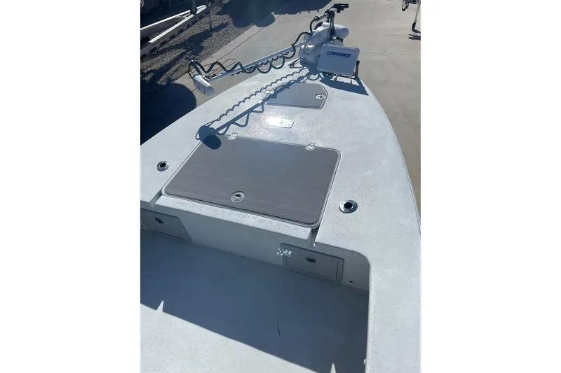 Slide: The Image of 2021 Young Boats Gulfshore 22 on trailer, featuring a powerful outboard motor. - 3