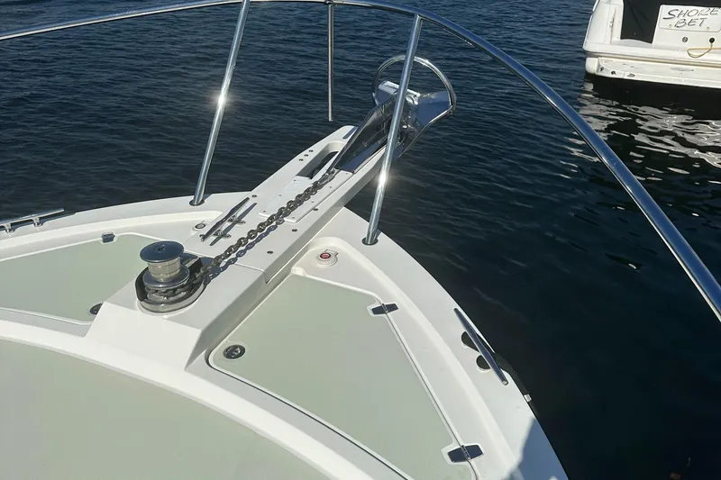 Slide: The Image of Bow of 2017 Back Cove 41 yacht with anchor chain and railing. - 13