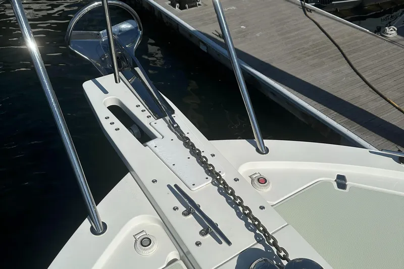 Slide: The Image of Bow of 2017 Back Cove 41 boat with anchor chain and dock view. - 17