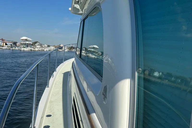 Slide: The Image of 2017 Back Cove 41 yacht side view on calm water. - 20