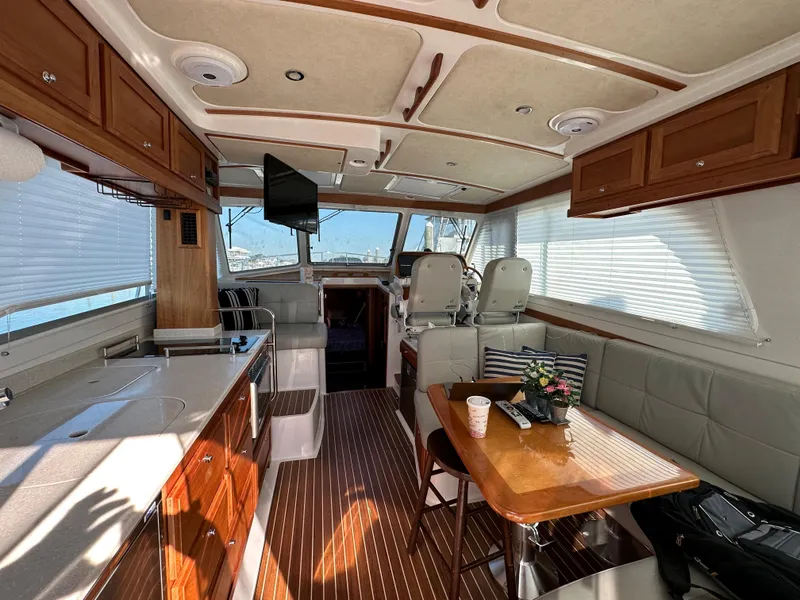Slide: The Image of Luxurious interior of a 2017 Back Cove 41 yacht with elegant wood finishes. - 25