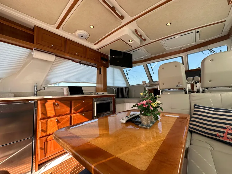 Slide: The Image of Luxurious interior of a 2017 Back Cove 41 yacht with elegant wood finishes and modern amenities. - 33