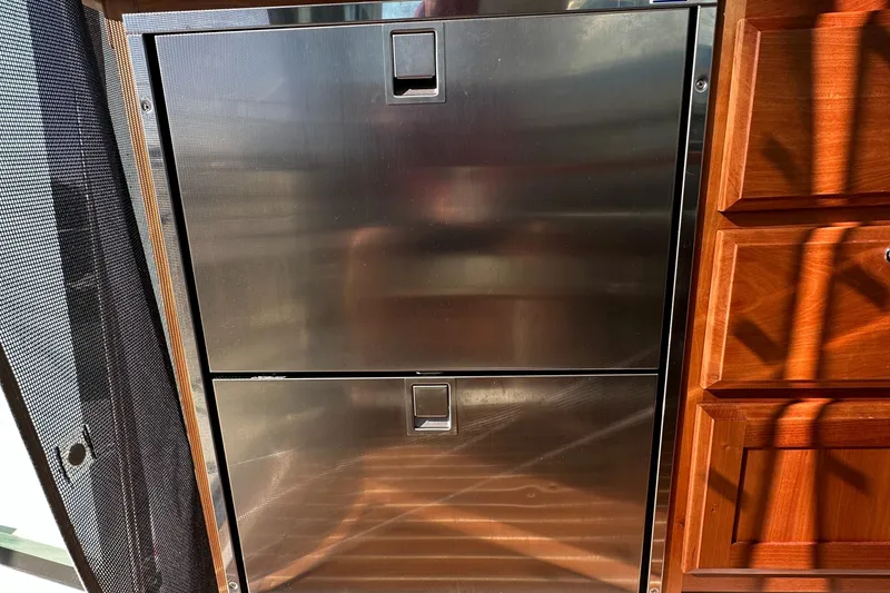 Slide: The Image of Stainless steel drawers in 2017 Back Cove 41 yacht interior, next to wooden cabinetry. - 39