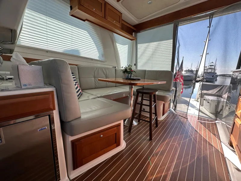 Slide: The Image of Interior of 2017 Back Cove 41 yacht with elegant seating and wooden flooring. - 41