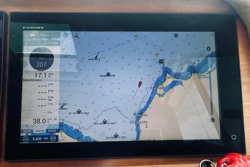 Slide: The Image of Navigation display on a 2017 Back Cove 41, showing nautical chart and vessel data. - 55