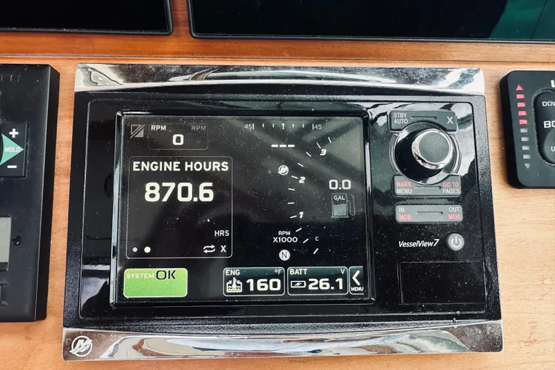Slide: The Image of Display panel of a 2017 Back Cove 41 showing 870.6 engine hours. - 73