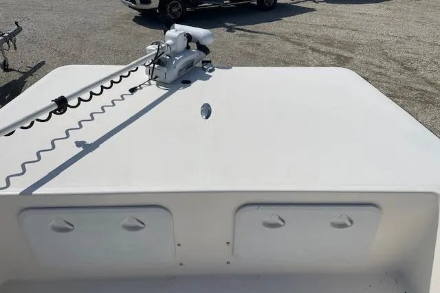 Slide: The Image of 2007 KenCraft 2260 BAYRIDER boat deck with trolling motor and storage compartments. - 11