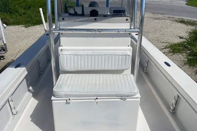 Slide: The Image of 2007 KenCraft 2260 BAYRIDER boat interior with white seating and console. - 12