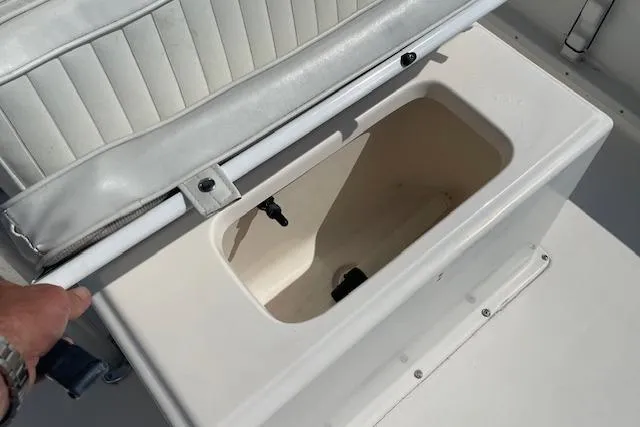 Slide: The Image of 2007 KenCraft 2260 BAYRIDER boat storage compartment with open lid. - 13