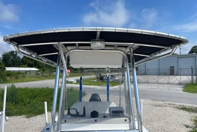 Slide: The Image of 2007 KenCraft 2260 BAYRIDER boat with T-top, parked outdoors. - 4