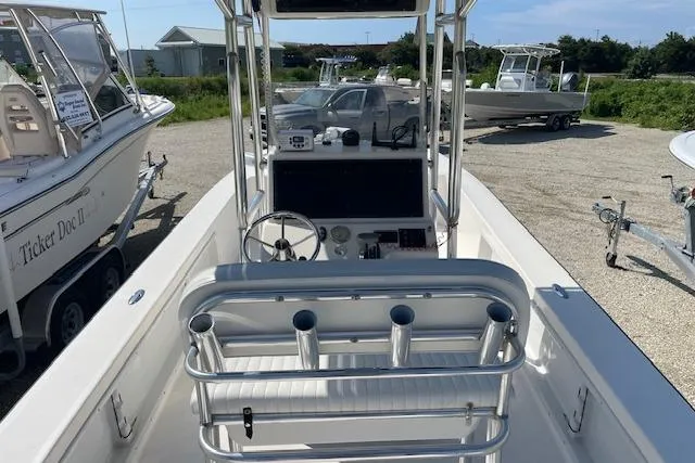 Slide: The Image of 2007 KenCraft 2260 BAYRIDER boat interior with steering console and rod holders. - 8