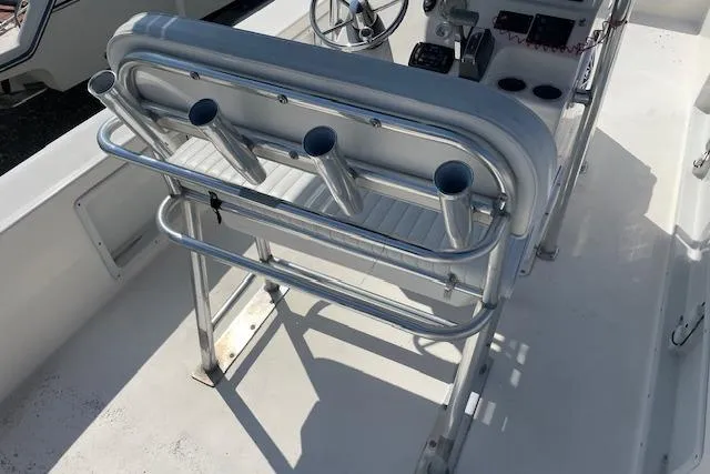 Slide: The Image of 2007 KenCraft 2260 BAYRIDER boat interior with rod holders and steering console. - 9