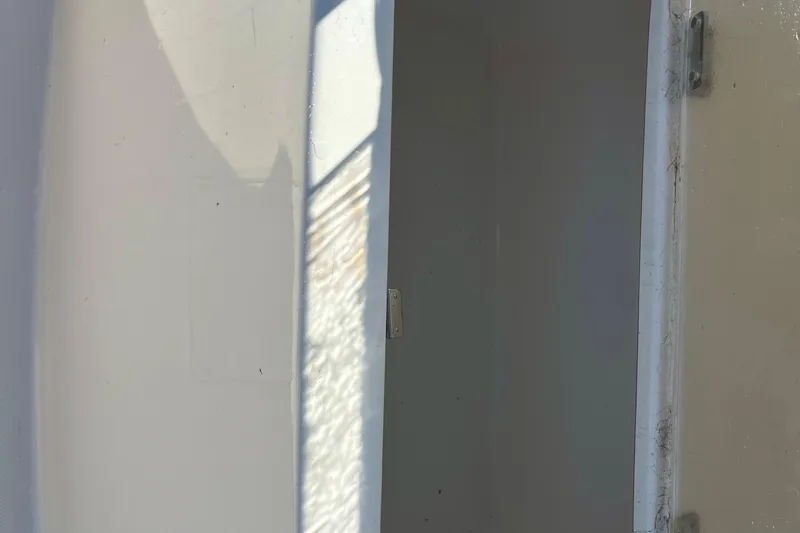 Slide: The Image of Interior view of a 2023 Trophy T24CC boat compartment. - 21