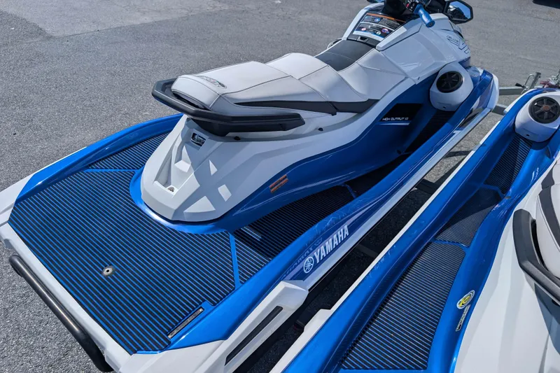 Slide: The Image of 2021 Yamaha WaveRunner VX Deluxe in blue and white, parked on a trailer. - 9