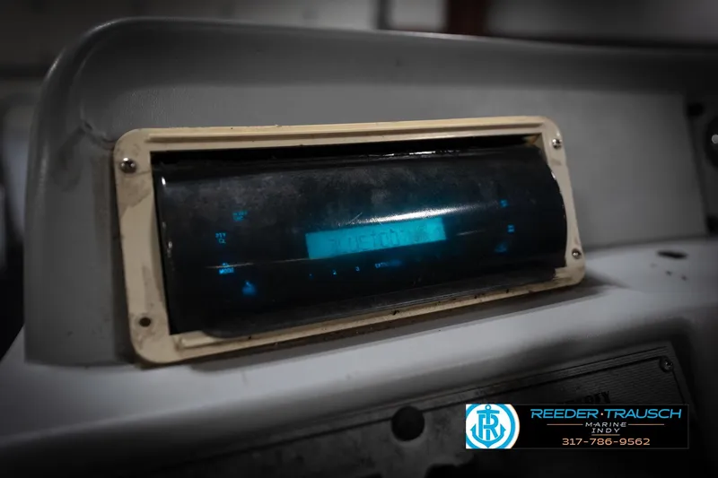 Slide: The Image of Dashboard of a 1993 Godfrey Sweetwater boat with a digital display. - 27