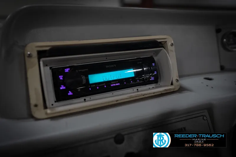 Slide: The Image of 1993 Godfrey Sweetwater boat dashboard with Sony stereo system. - 28