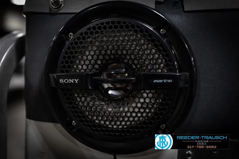 Slide: The Image of Sony marine speaker on a 1993 Godfrey Sweetwater boat, Reeder-Trausch Marine logo visible. - 41