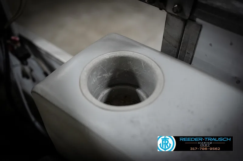 Slide: The Image of 1993 Godfrey Sweetwater boat cup holder, close-up view, Reeder Trausch Marine logo visible. - 42
