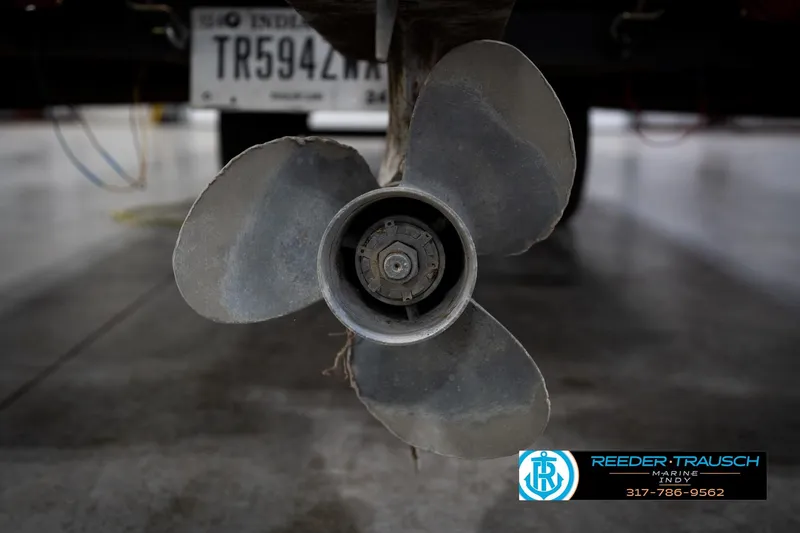 Slide: The Image of Propeller of a 1993 Godfrey Sweetwater boat in a garage setting. - 47