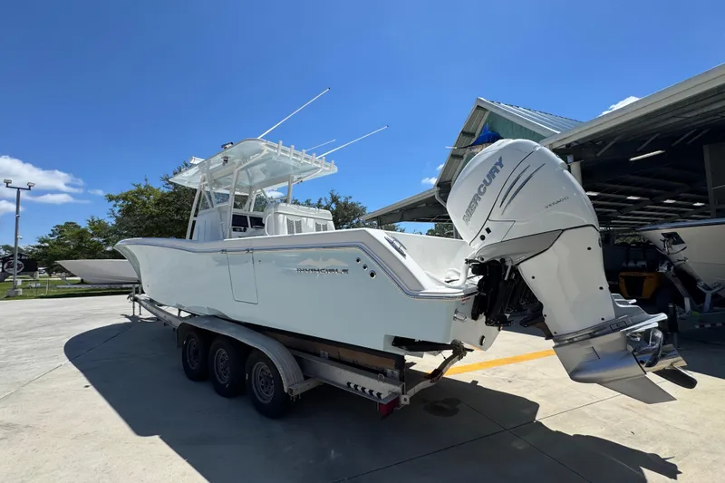 Slide: The Image of 2021 Invincible 36 Open Fisherman boat with Mercury engine on trailer. - 18