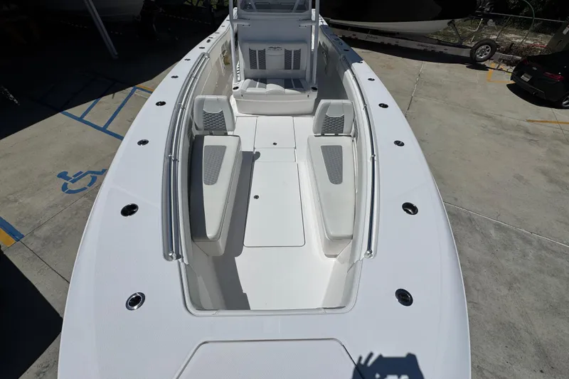 Slide: The Image of 2021 Invincible 36 Open Fisherman boat interior with seating and deck view. - 23