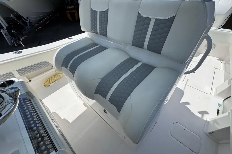 Slide: The Image of 2021 Invincible 36 Open Fisherman boat seat with gray and white upholstery. - 30