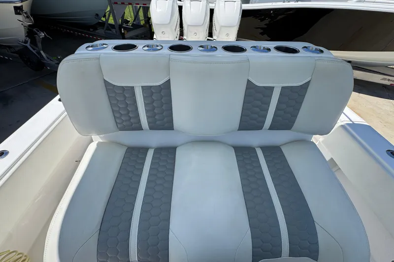 Slide: The Image of 2021 Invincible 36 Open Fisherman boat seat with gray and white upholstery. - 31