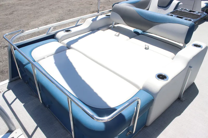 Slide: The Image of 2021 Tahoe Pontoon LTZ Versatile Rear Bench 24' with blue and white seating. - 5
