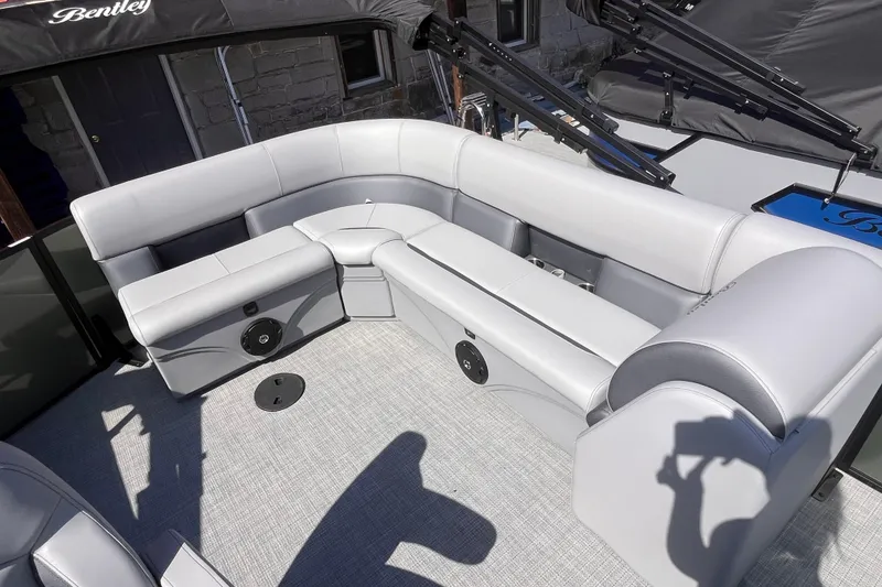 Slide: The Image of 2025 Bentley Pontoons Legacy Cruise XL interior with luxurious seating and modern design. - 3