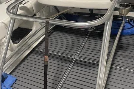 Slide: The Image of 2022 Prowler 31 boat with dual Mercury engines and stainless steel railings. - 13