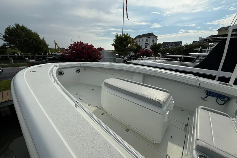 Slide: The Image of 2021 Yellowfin 36 Offshore boat cruising at sunset on calm waters. - 4