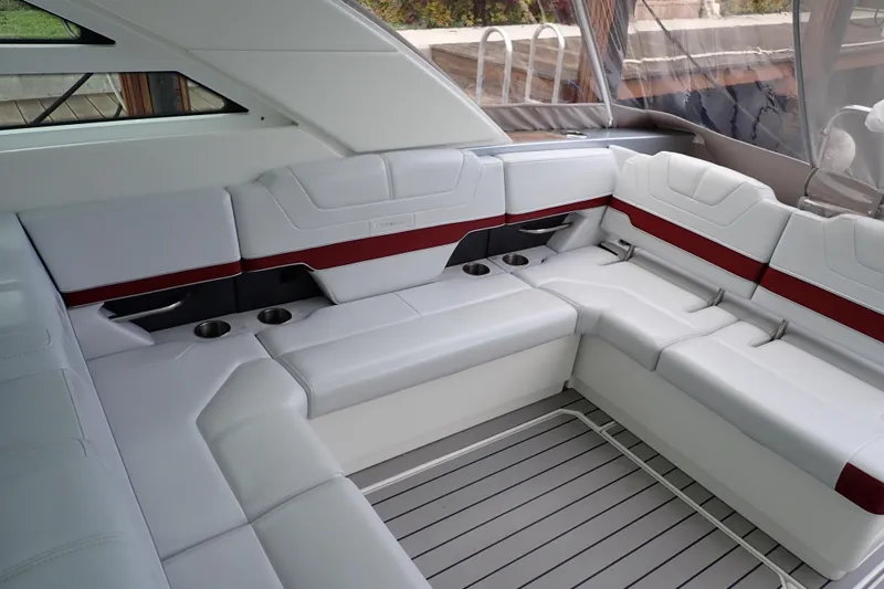 Slide: The Image of 2020 Formula 430 Super Sport Crossover boat with multiple engines on calm water. - 16