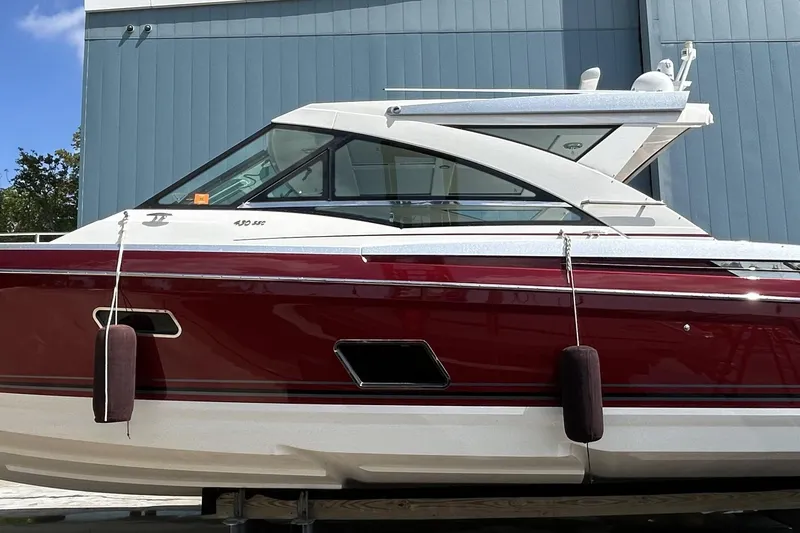 Slide: The Image of 2020 Formula 430 Super Sport Crossover yacht interior with luxurious seating on open water. - 5