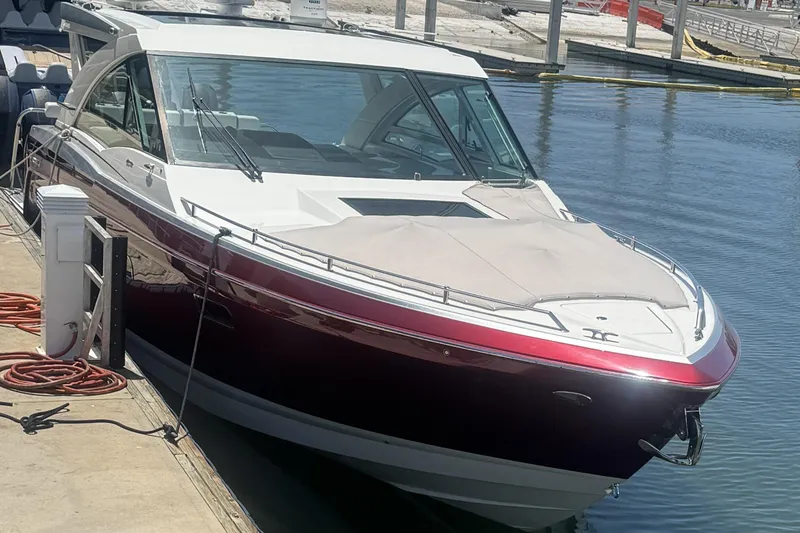 Slide: The Image of 2020 Formula 430 Super Sport Crossover yacht interior with luxurious seating and ocean view. - 6