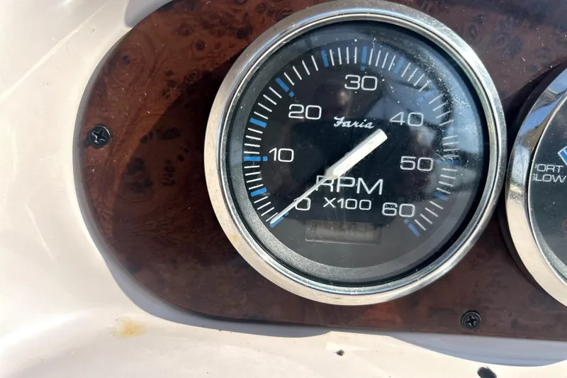Slide: The Image of Close-up of a 2001 Regal Commodore 2960 RPM gauge, displaying up to 60 x 100 RPM. - 14