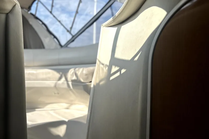 Slide: The Image of Interior of a 2001 Regal Commodore 2960 boat with sunlight and seating. - 20