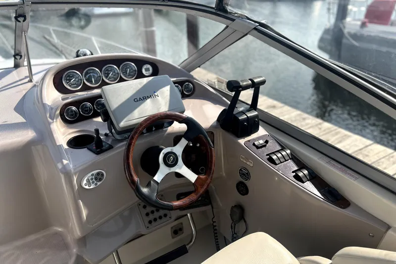 Slide: The Image of Cockpit of 2001 Regal Commodore 2960 boat with Garmin navigation system. - 6