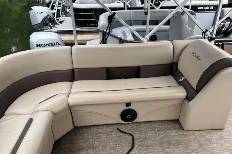 Slide: The Image of 2025 Bentley Pontoons 220 Cruise XL with beige seating and Honda outboard motors. - 8