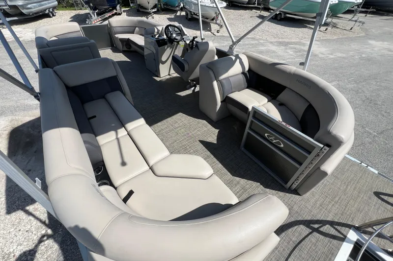 Slide: The Image of Kicker audio system on 2023 Harris Cruiser 230 boat dashboard. - 13