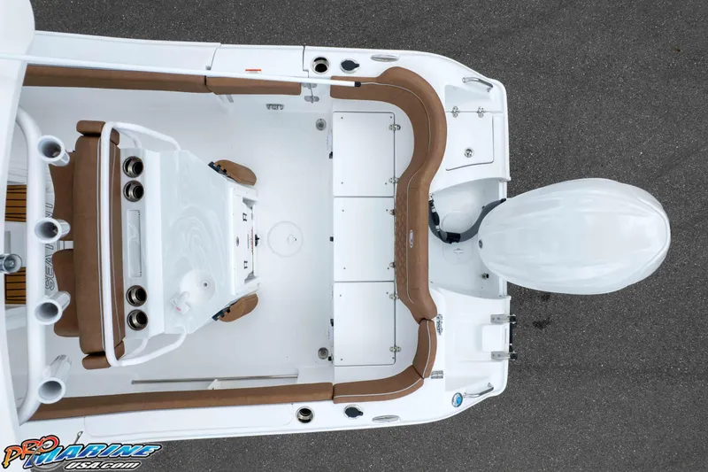 Slide: The Image of Overhead view of 2025 Sea Hunt Ultra 235 SE boat interior and engine. - 15