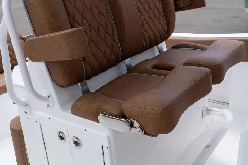 Slide: The Image of Brown leather seating on 2025 Sea Hunt Ultra 235 SE boat. - 43