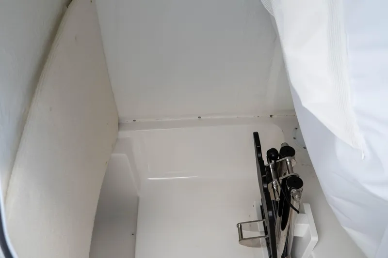 Slide: The Image of Interior storage compartment of 2025 Sea Hunt Ultra 235 SE boat. - 49