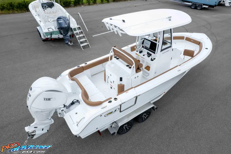 Slide: The Image of 2025 Sea Hunt Ultra 235 SE boat with Yamaha engine on trailer. - 6