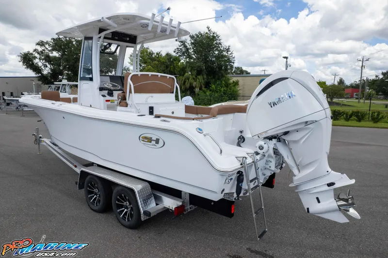 Slide: The Image of 2025 Sea Hunt Ultra 235 SE boat on trailer with Yamaha outboard motor. - 8