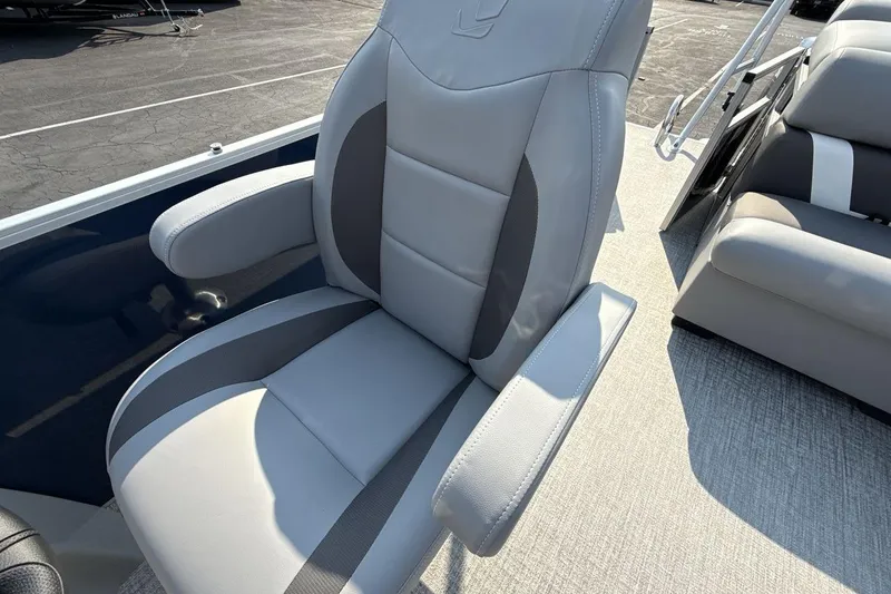 Slide: The Image of 2026 Landau Island Breeze 21 C boat seat, featuring sleek gray upholstery and modern design. - 13