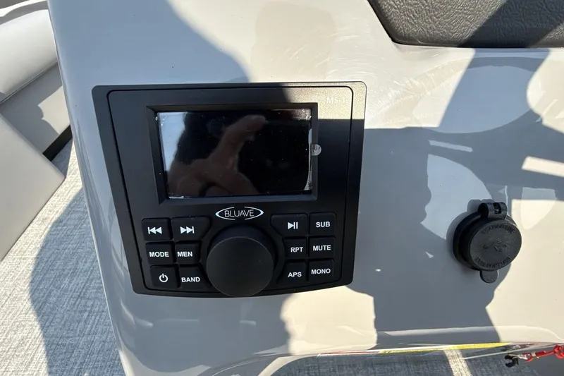 Slide: The Image of Control panel of 2026 Landau Island Breeze 21 C boat with audio system. - 19