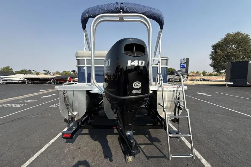 Slide: The Image of 2026 Landau Island Breeze 21 C pontoon boat with Suzuki 140 outboard motor. - 4