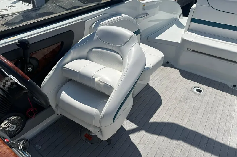 Slide: The Image of 2009 Formula 270 Bowrider interior with white leather seating and steering wheel. - 18