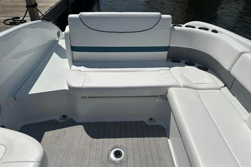 Slide: The Image of 2009 Formula 270 Bowrider interior with white seating and cup holders. - 20